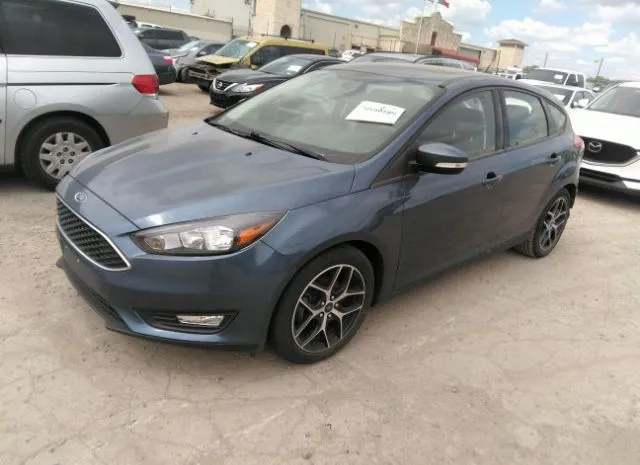 Photo 1 VIN: 1FADP3M26JL219061 - FORD FOCUS 