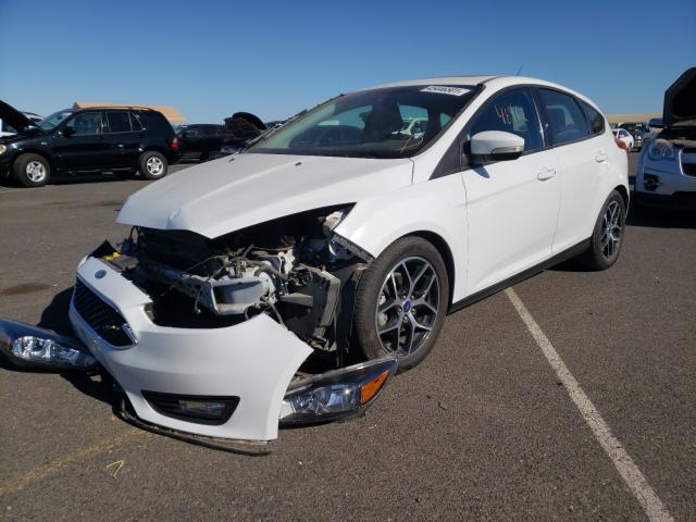 Photo 1 VIN: 1FADP3M26JL261150 - FORD FOCUS SEL 