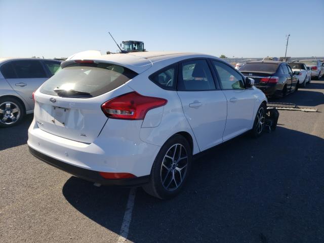 Photo 3 VIN: 1FADP3M26JL261150 - FORD FOCUS SEL 