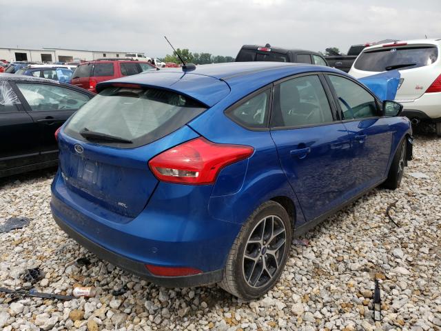 Photo 3 VIN: 1FADP3M26JL300867 - FORD FOCUS 