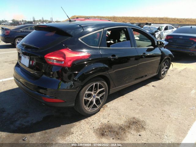 Photo 3 VIN: 1FADP3M27HL308566 - FORD FOCUS 