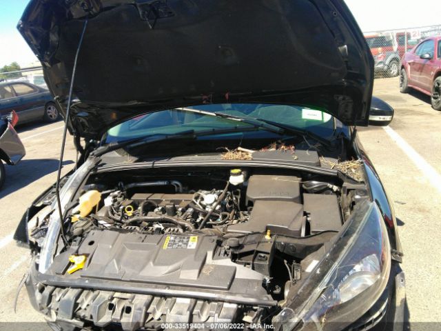 Photo 9 VIN: 1FADP3M27HL308566 - FORD FOCUS 