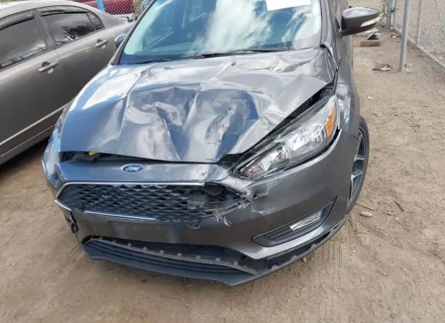 Photo 5 VIN: 1FADP3M27HL314948 - FORD FOCUS 