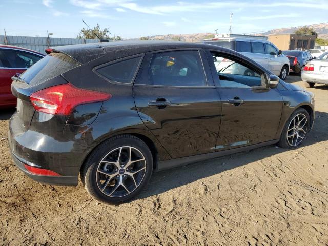 Photo 2 VIN: 1FADP3M27JL224432 - FORD FOCUS SEL 