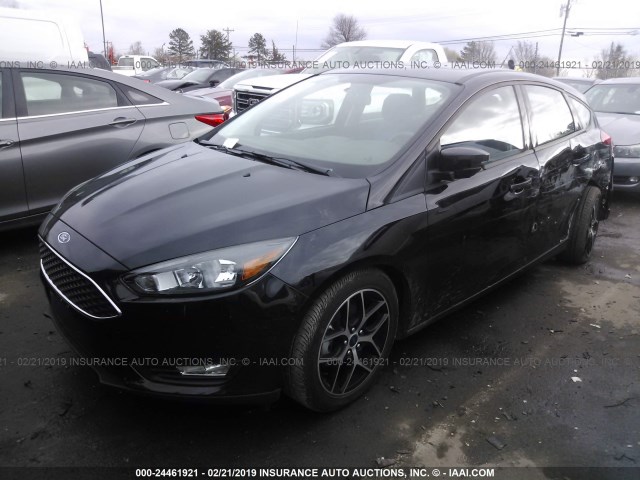 Photo 1 VIN: 1FADP3M27JL226651 - FORD FOCUS 