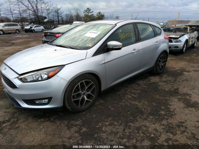 Photo 1 VIN: 1FADP3M28HL261824 - FORD FOCUS 