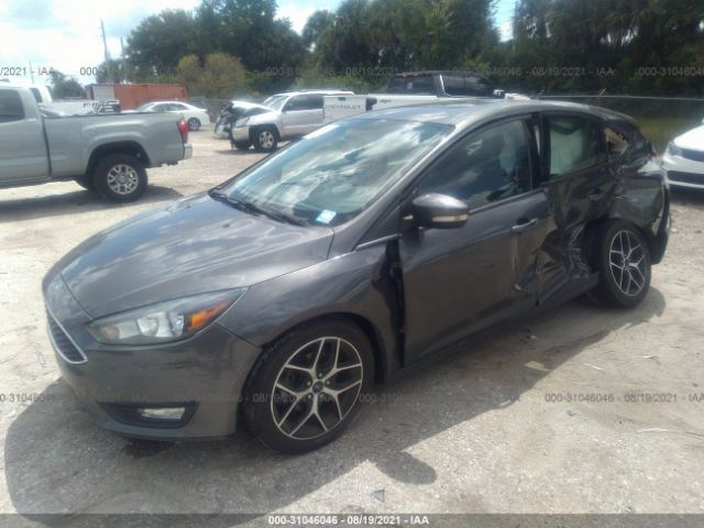 Photo 1 VIN: 1FADP3M28HL273083 - FORD FOCUS 