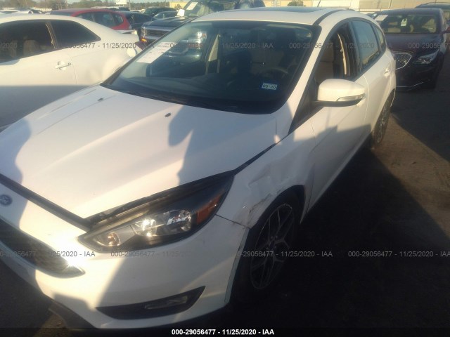 Photo 1 VIN: 1FADP3M28HL290062 - FORD FOCUS 