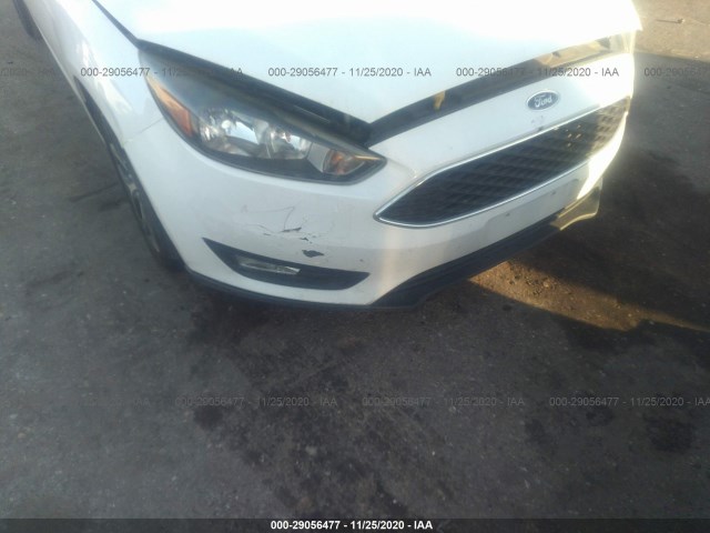 Photo 5 VIN: 1FADP3M28HL290062 - FORD FOCUS 