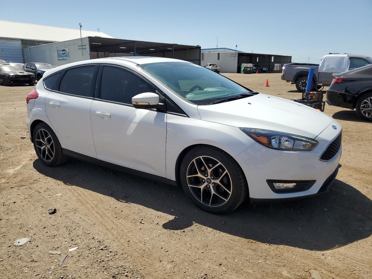 Photo 3 VIN: 1FADP3M28JL224066 - FORD FOCUS 