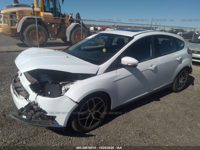 Photo 1 VIN: 1FADP3M28JL249517 - FORD FOCUS 