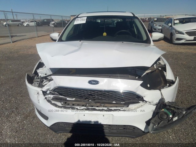 Photo 5 VIN: 1FADP3M28JL249517 - FORD FOCUS 