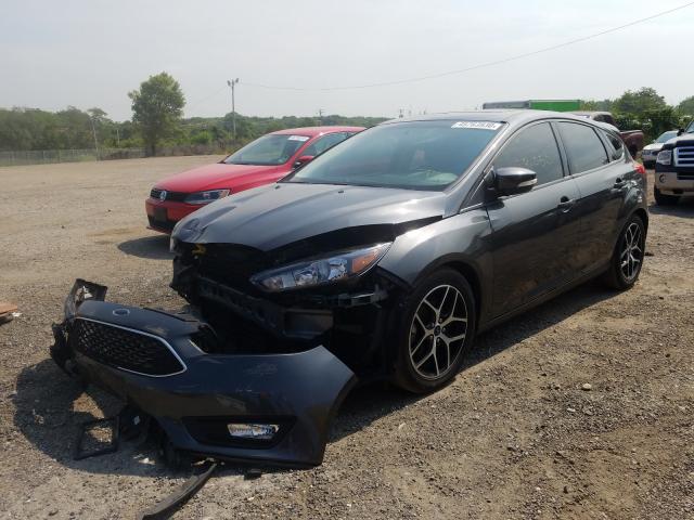 Photo 1 VIN: 1FADP3M28JL291783 - FORD FOCUS 