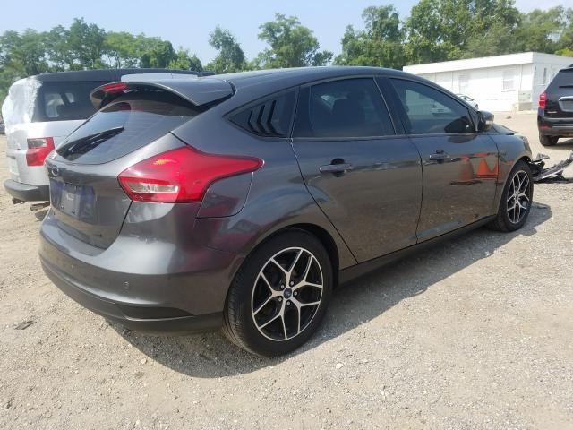 Photo 3 VIN: 1FADP3M28JL291783 - FORD FOCUS 