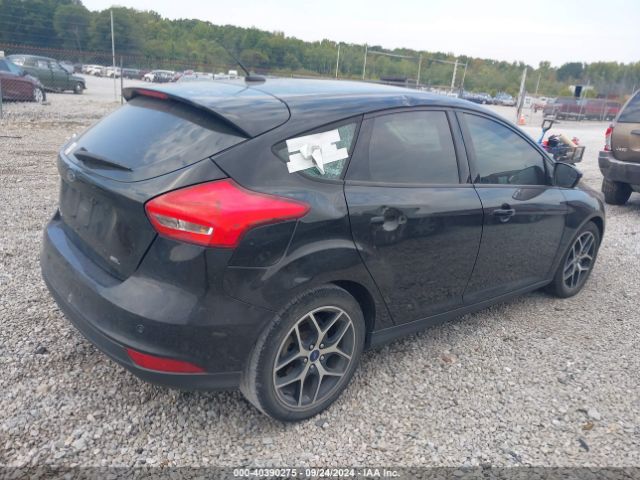 Photo 3 VIN: 1FADP3M28JL299351 - FORD FOCUS 