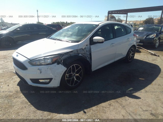 Photo 1 VIN: 1FADP3M28JL313667 - FORD FOCUS 