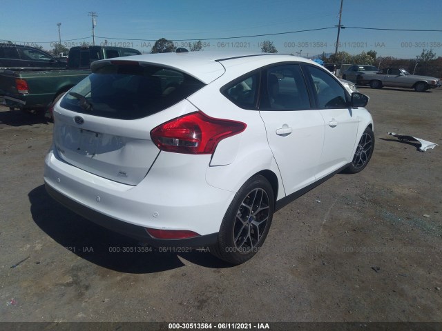 Photo 3 VIN: 1FADP3M28JL313667 - FORD FOCUS 