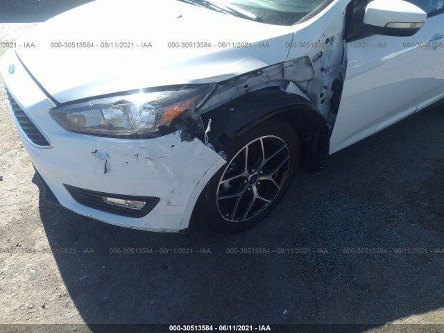 Photo 5 VIN: 1FADP3M28JL313667 - FORD FOCUS 