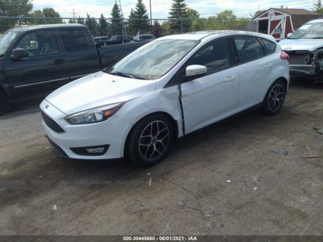 Photo 1 VIN: 1FADP3M29HL243946 - FORD FOCUS 