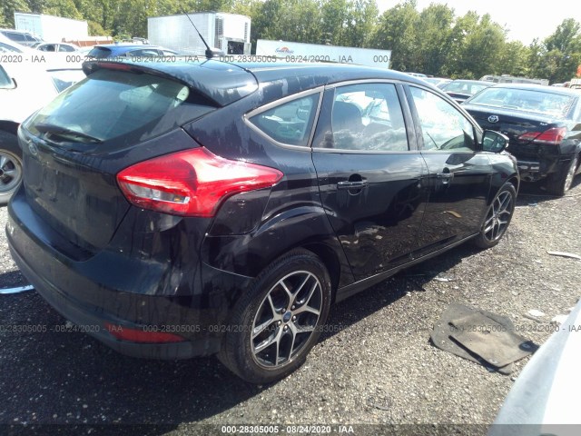 Photo 3 VIN: 1FADP3M29HL323134 - FORD FOCUS 