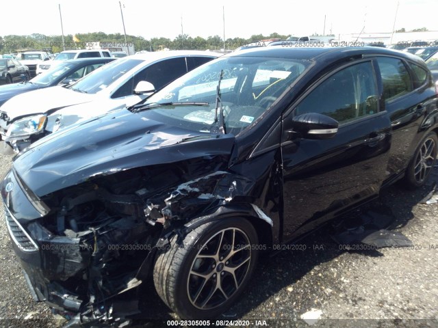 Photo 5 VIN: 1FADP3M29HL323134 - FORD FOCUS 