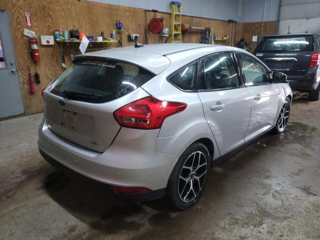 Photo 3 VIN: 1FADP3M29JL229017 - FORD FOCUS SEL 