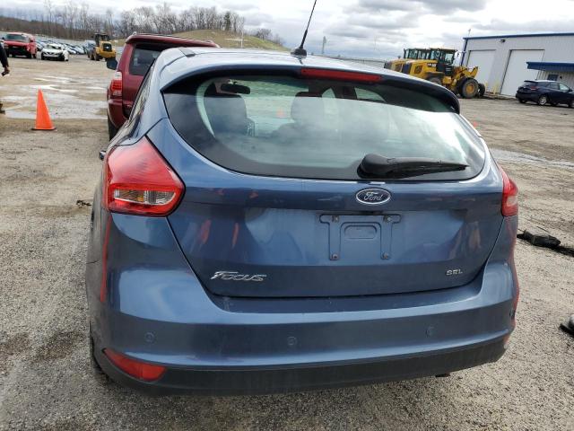 Photo 5 VIN: 1FADP3M29JL297835 - FORD FOCUS 