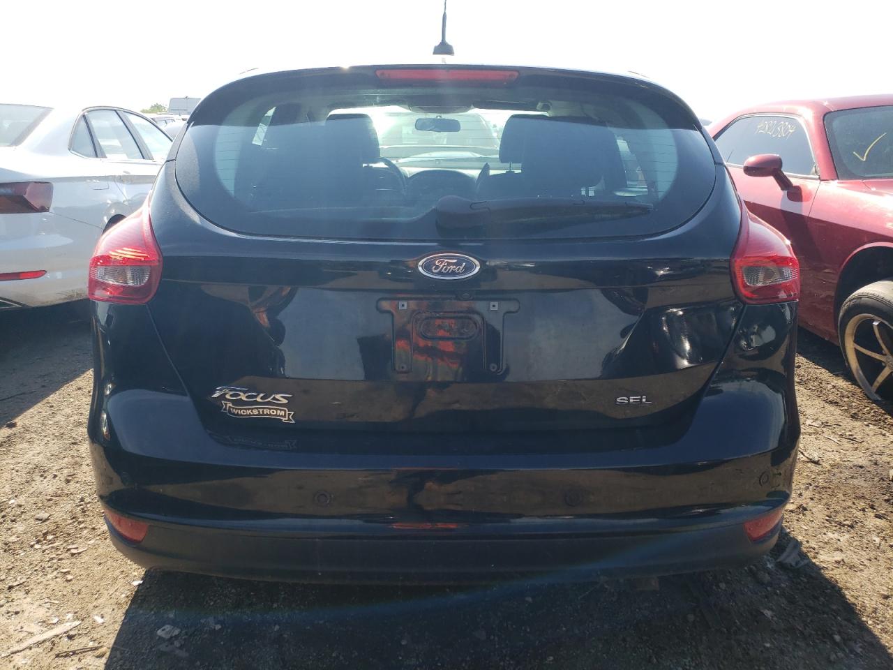 Photo 5 VIN: 1FADP3M29JL309370 - FORD FOCUS 