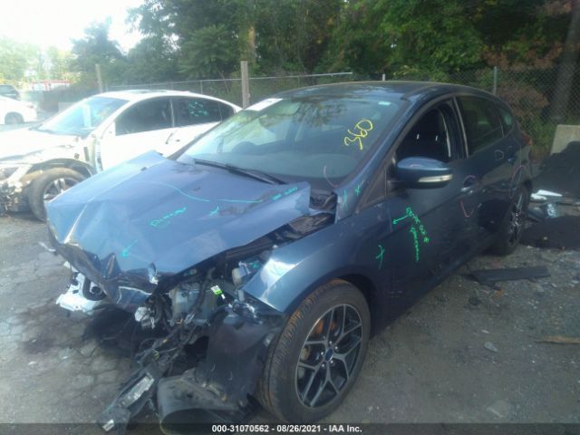 Photo 1 VIN: 1FADP3M2XJL227423 - FORD FOCUS 