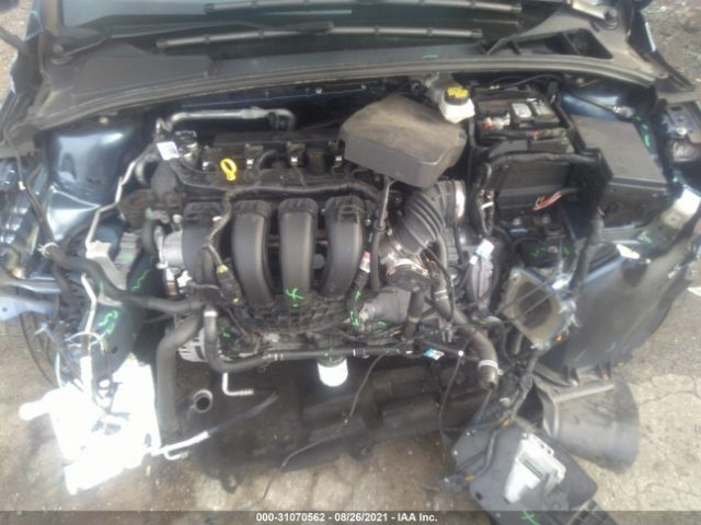 Photo 9 VIN: 1FADP3M2XJL227423 - FORD FOCUS 