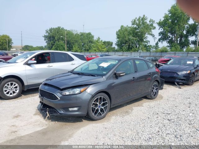 Photo 1 VIN: 1FADP3M2XJL258087 - FORD FOCUS 