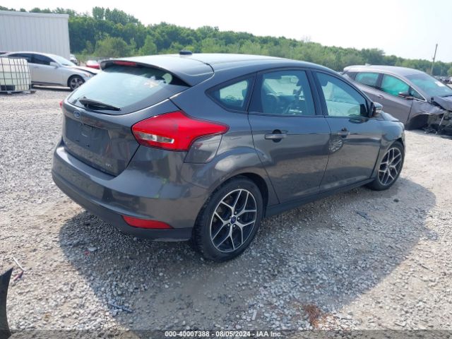 Photo 3 VIN: 1FADP3M2XJL258087 - FORD FOCUS 