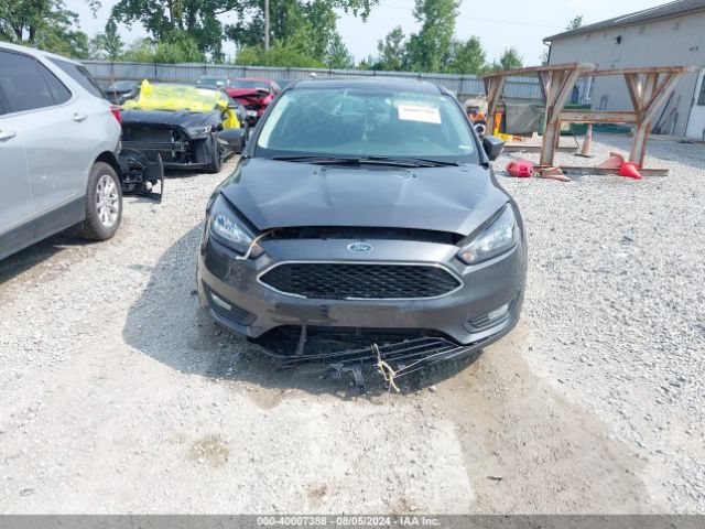 Photo 5 VIN: 1FADP3M2XJL258087 - FORD FOCUS 