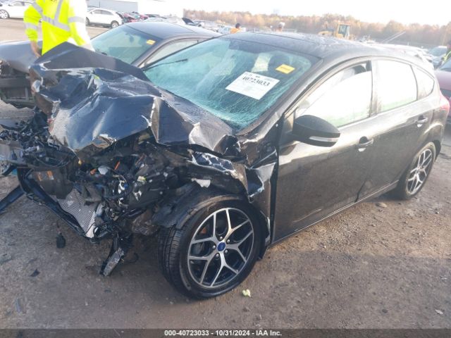 Photo 1 VIN: 1FADP3M2XJL267615 - FORD FOCUS 