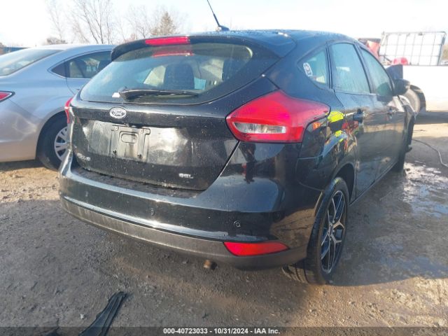 Photo 3 VIN: 1FADP3M2XJL267615 - FORD FOCUS 