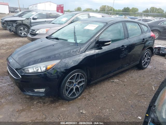 Photo 1 VIN: 1FADP3M2XJL310463 - FORD FOCUS 