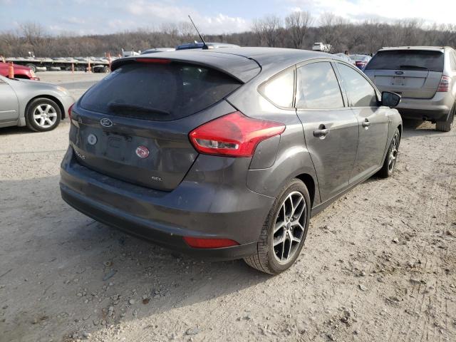 Photo 3 VIN: 1FADP3M2XJL312066 - FORD FOCUS 