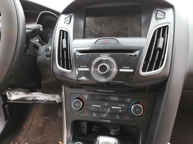 Photo 8 VIN: 1FADP3N20FL229624 - FORD FOCUS TITA 