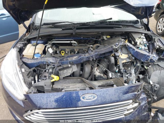 Photo 9 VIN: 1FADP3N20GL222612 - FORD FOCUS 