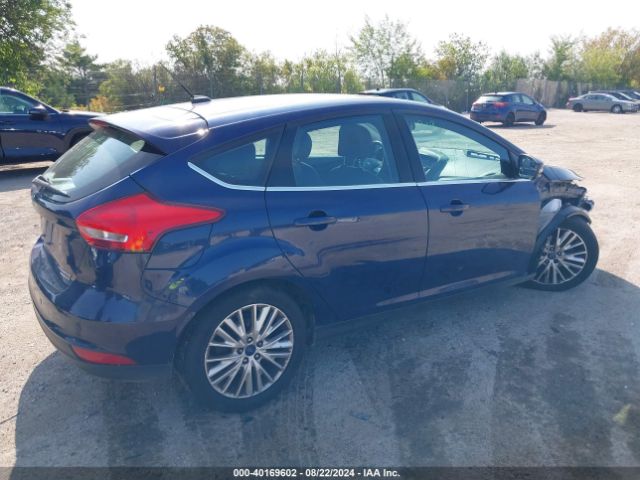 Photo 3 VIN: 1FADP3N20GL318515 - FORD FOCUS 