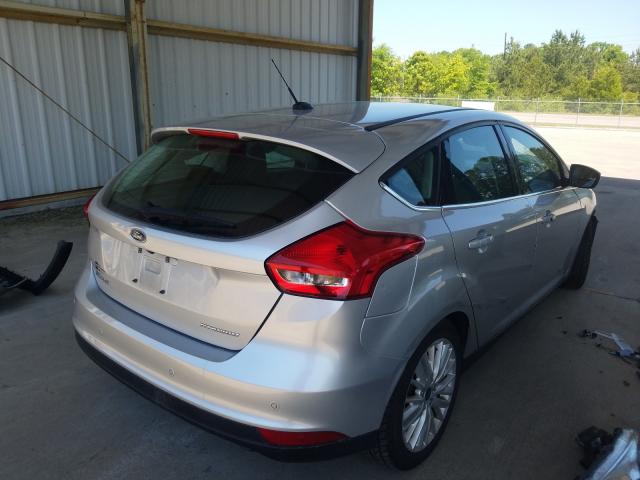 Photo 3 VIN: 1FADP3N20HL349054 - FORD FOCUS 