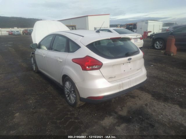 Photo 2 VIN: 1FADP3N21GL255960 - FORD FOCUS 