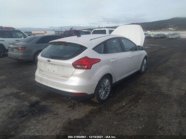 Photo 3 VIN: 1FADP3N21GL255960 - FORD FOCUS 