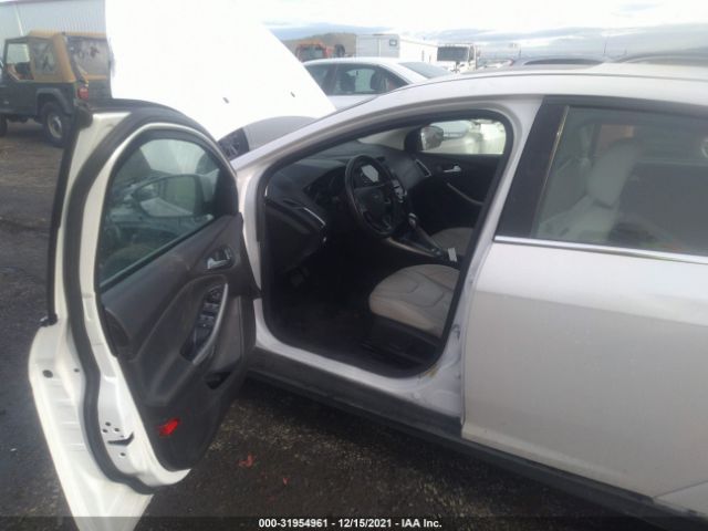 Photo 4 VIN: 1FADP3N21GL255960 - FORD FOCUS 