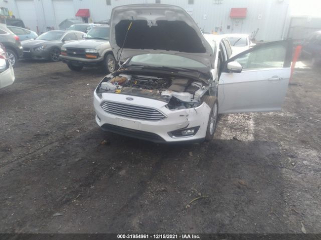 Photo 5 VIN: 1FADP3N21GL255960 - FORD FOCUS 