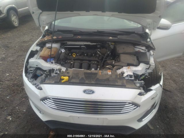 Photo 9 VIN: 1FADP3N21GL255960 - FORD FOCUS 