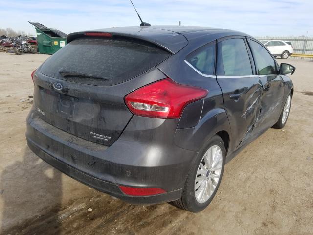 Photo 3 VIN: 1FADP3N21GL379548 - FORD FOCUS 