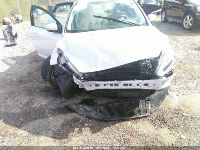 Photo 5 VIN: 1FADP3N21GL406599 - FORD FOCUS 