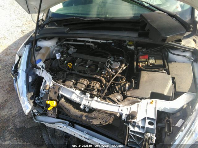 Photo 9 VIN: 1FADP3N21GL406599 - FORD FOCUS 