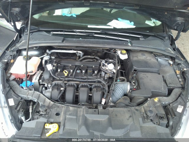 Photo 9 VIN: 1FADP3N21JL326520 - FORD FOCUS 